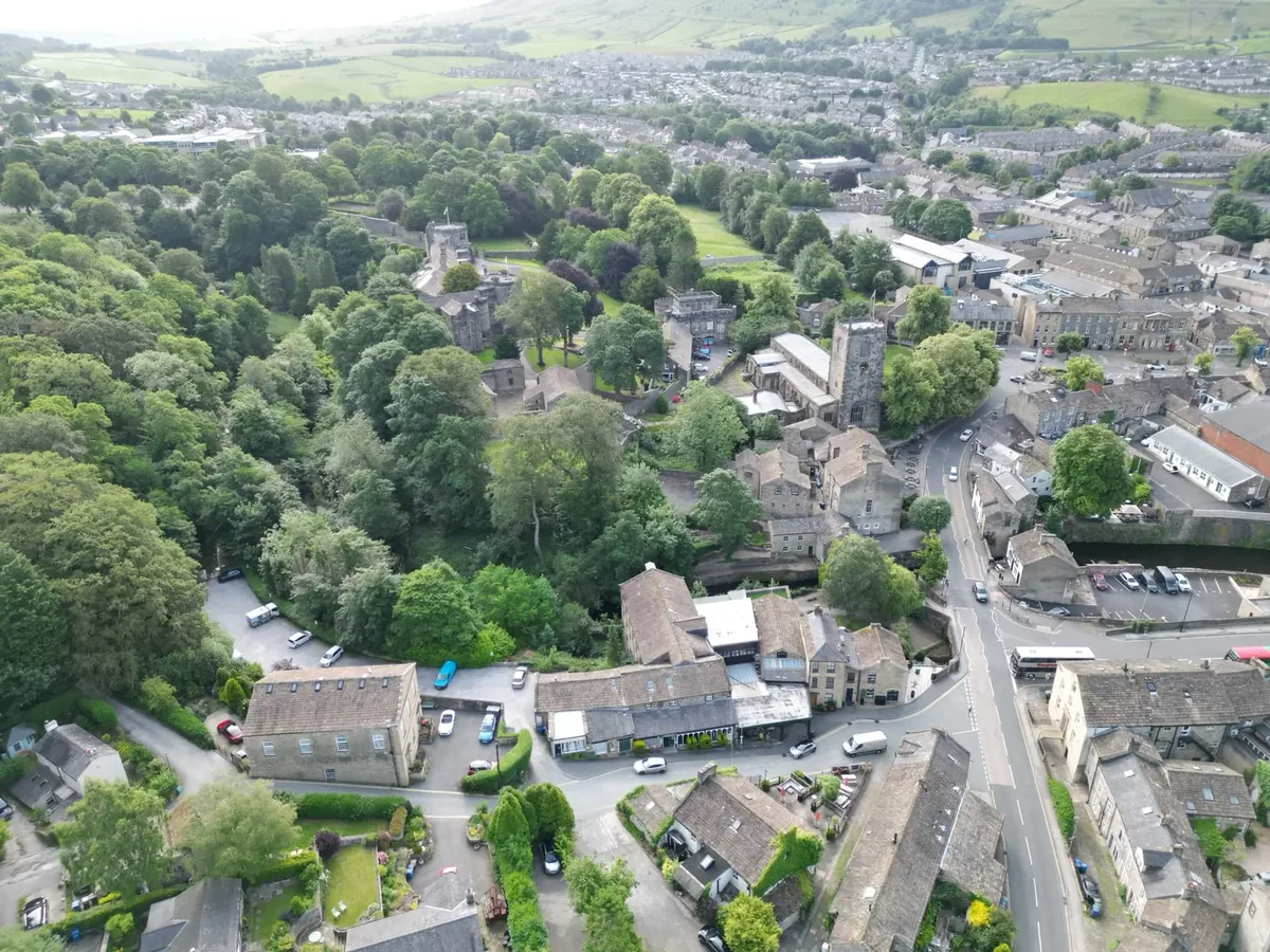Aerial view over Skipton showing the castle, the church and High Corn Mill